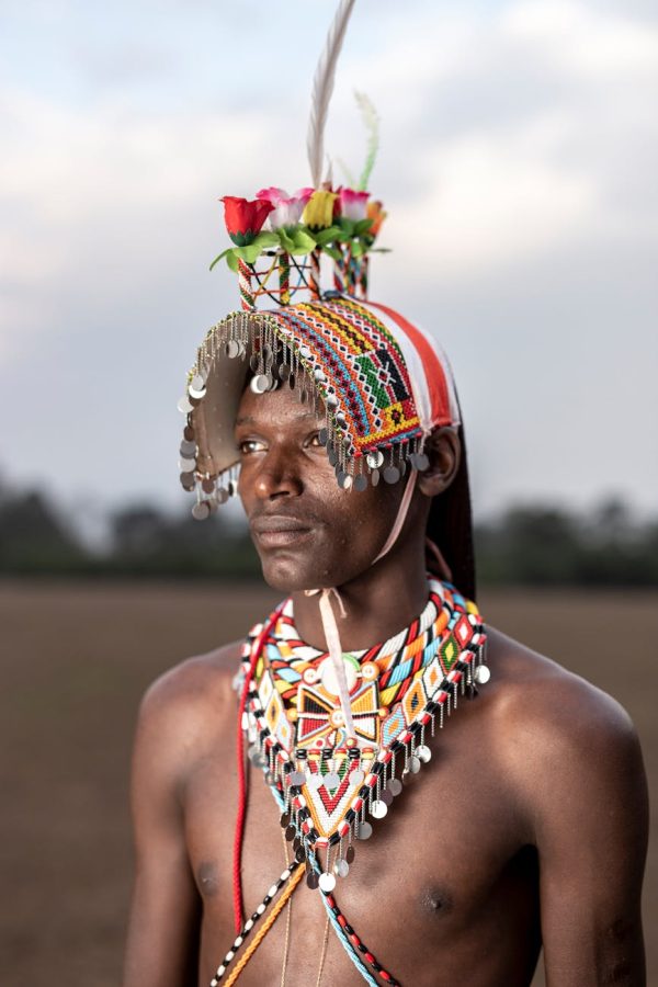 Maasai Warrior in traditional attire on a Luxury African Safari
